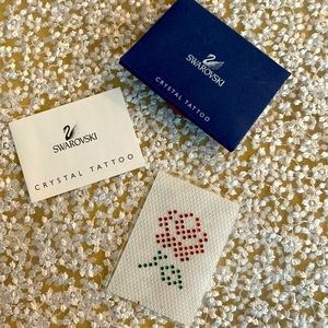 2001 Swarovski red rose tattoo